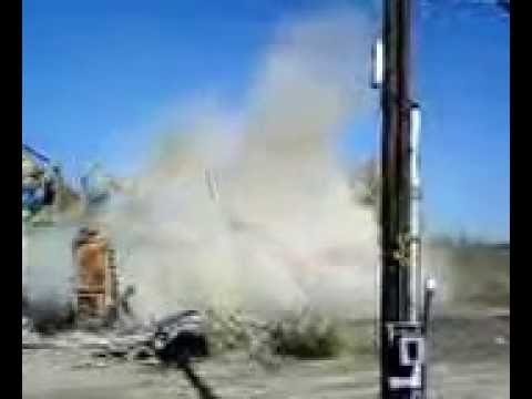 Danley Demolition excavator demolishing a structure